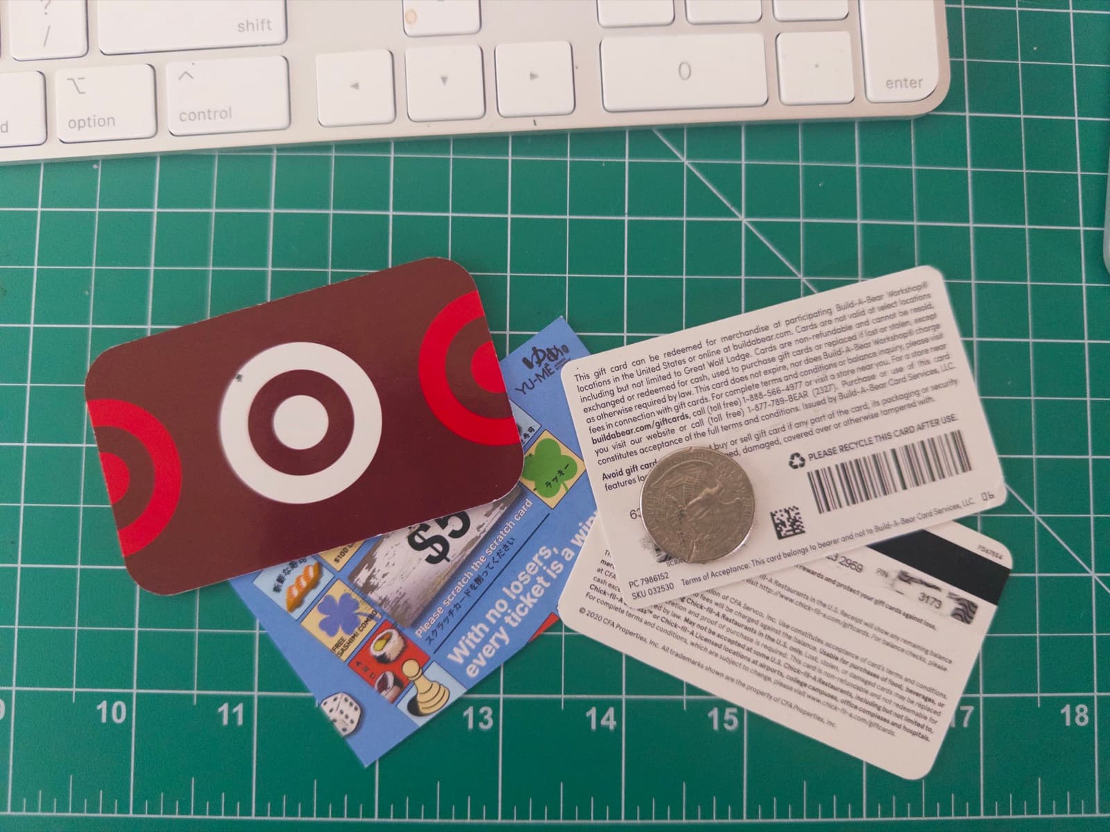 Gift cards and a quarter used for recording scratch sounds